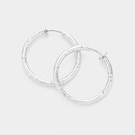 1.25 Inch Textured Metal Hoop Clip On Earrings