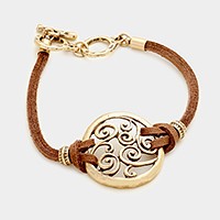 Filigree disc & faux suede toggle bracelet